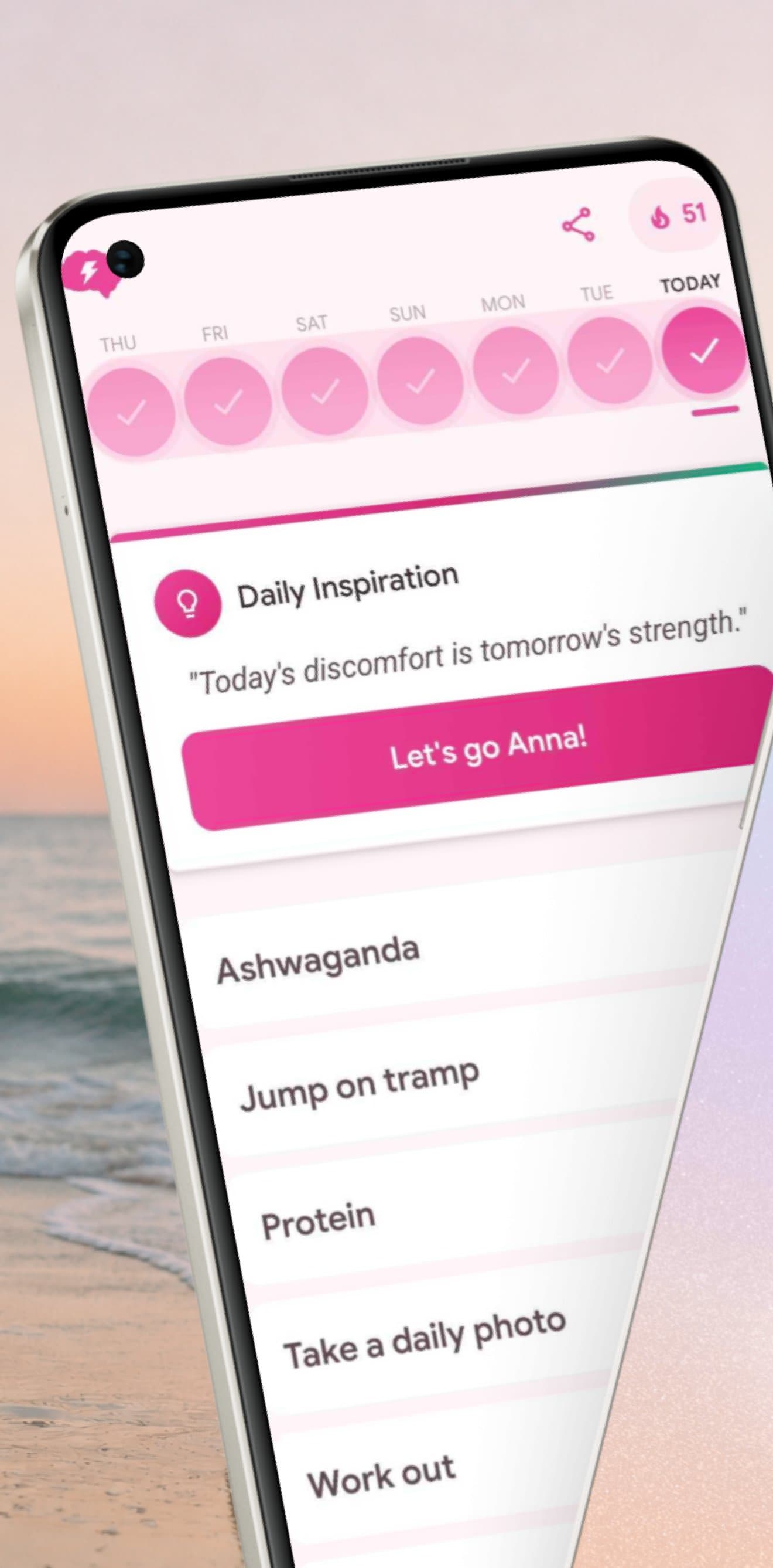 Habit Spark in a pink theme, with a daily inspiration card above the day's habits